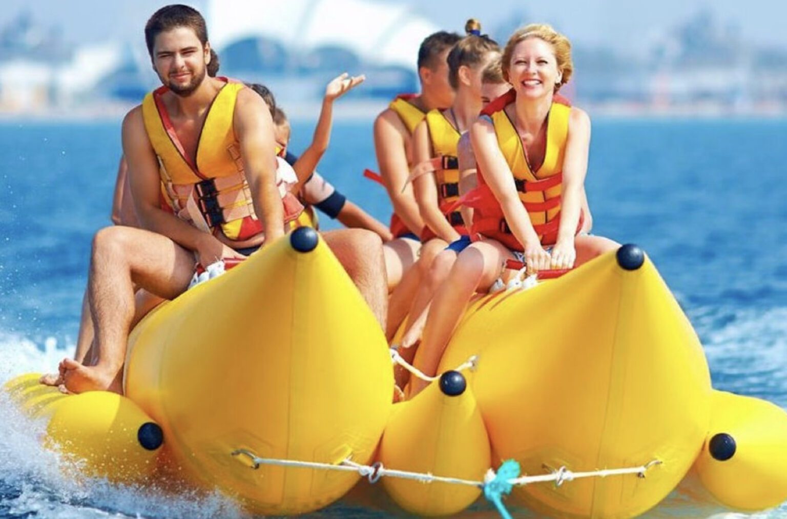 A family enjoying banana boat ride