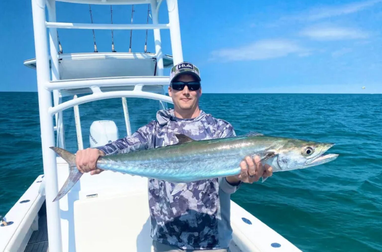 A happy man with the biggest catch of the day on Dubai Yachts