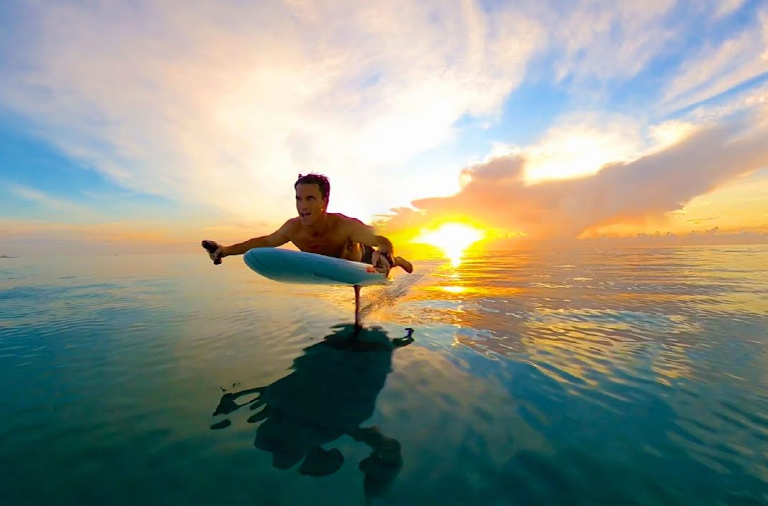 A man enjoying efoil board on the Dubai Sea