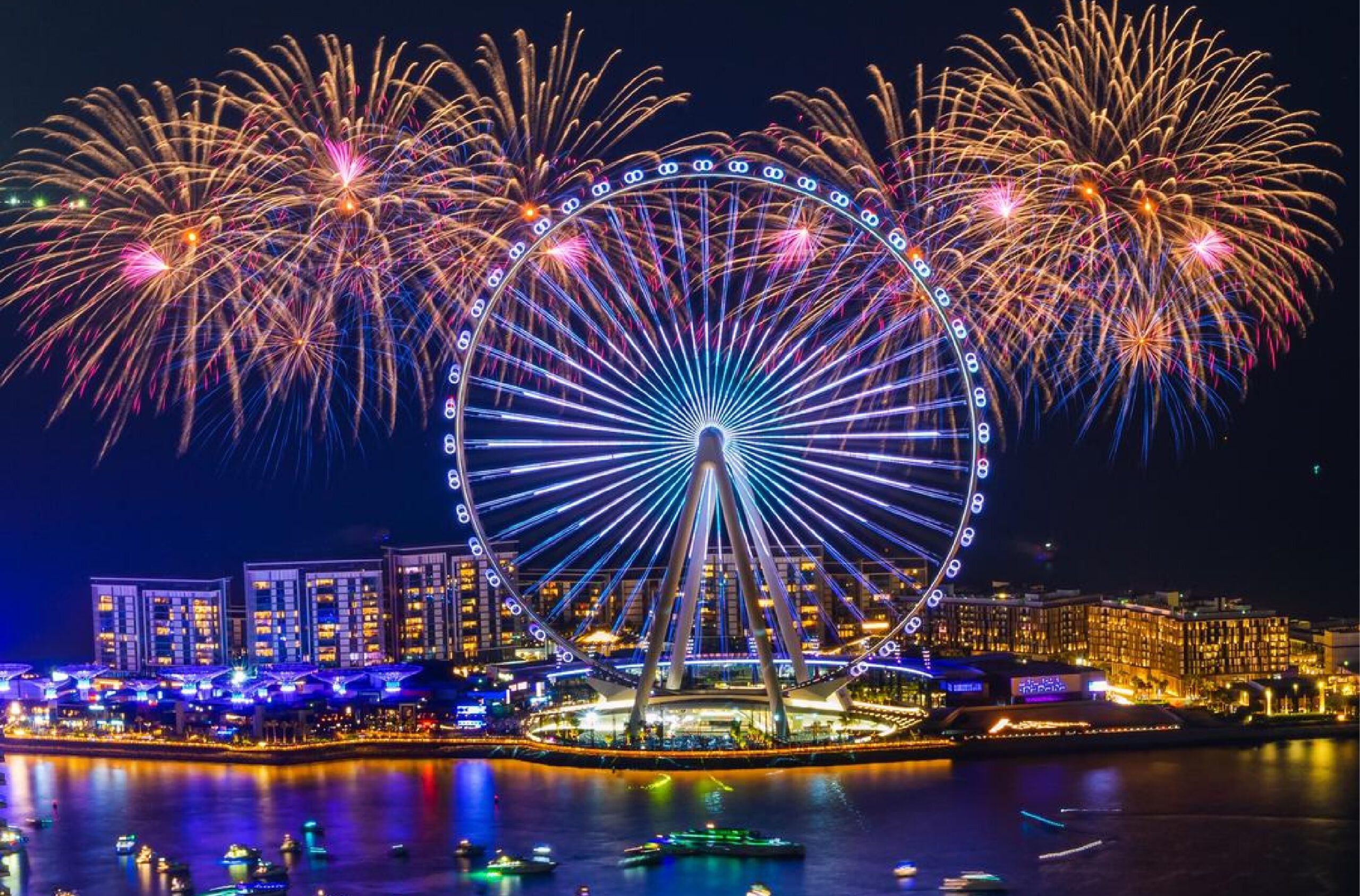 Ain Wheel Sparkling on New Year Fireworks
