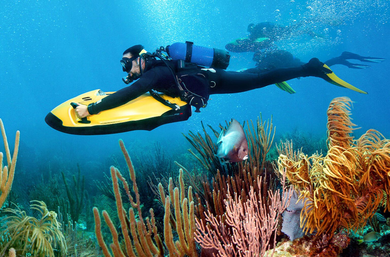 A man exploring the coral reefs on seabob