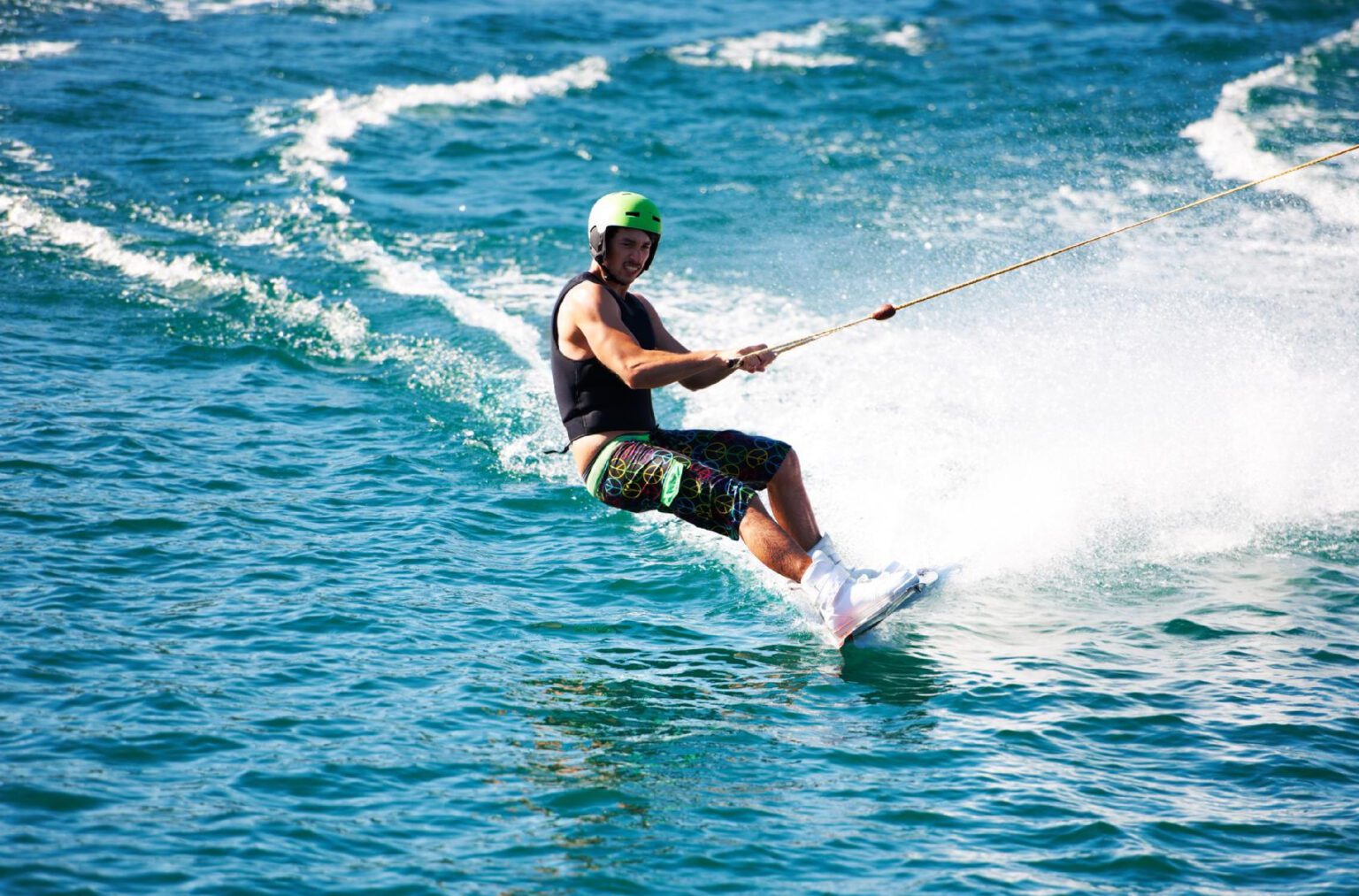 A man catching air in Dubai's pristine coastal paradise