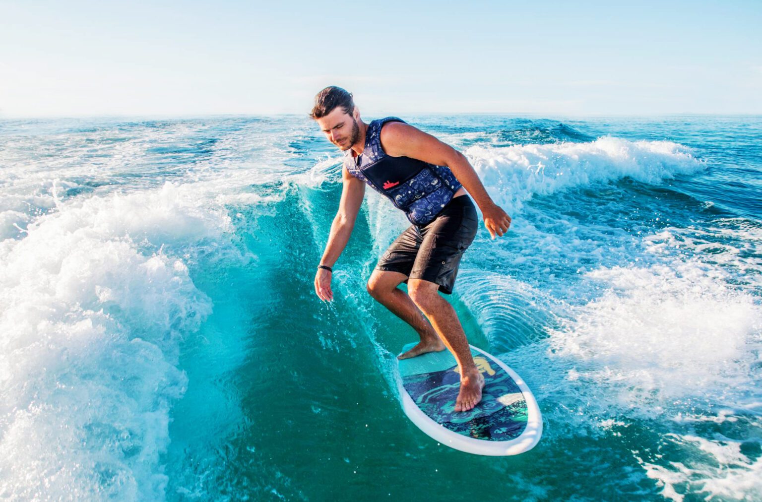 Gliding through the waves on wake surfing