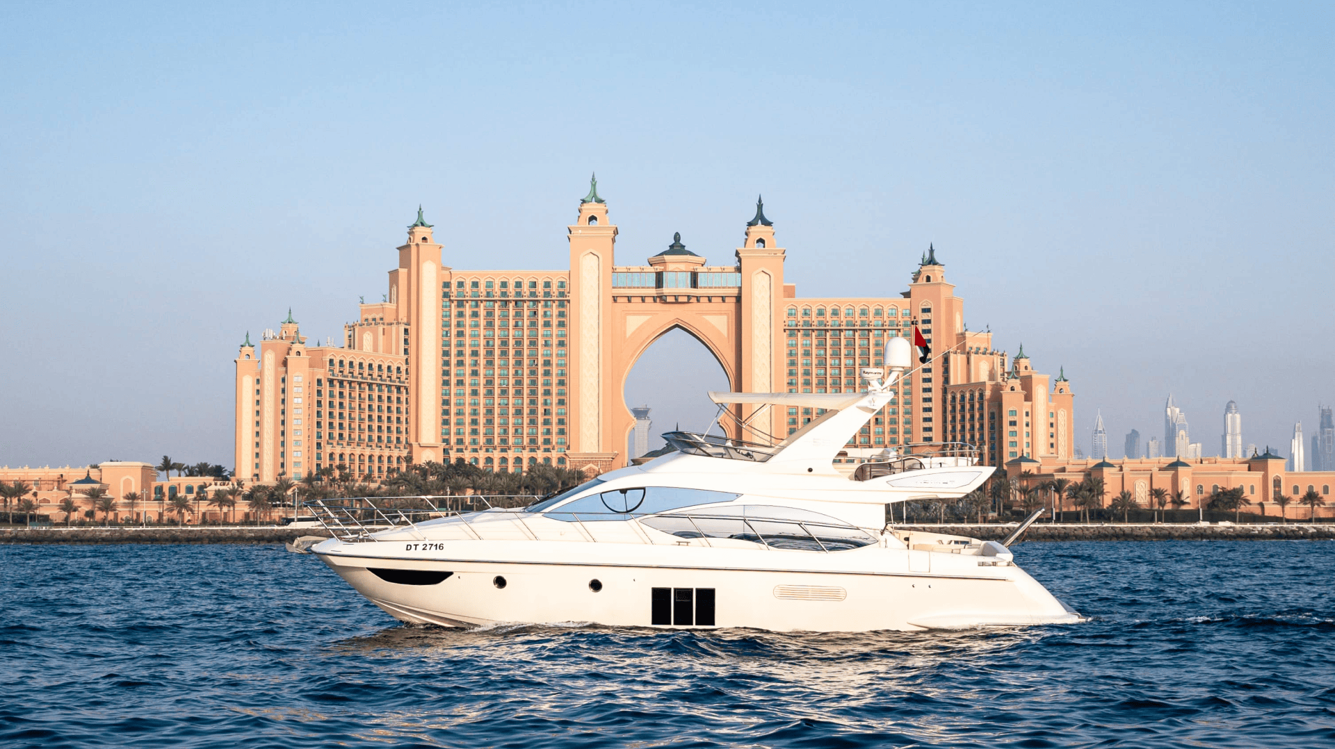 Kami 53ft Dubai Yachts Sailing on Calm Water in front of Palm The Atlantis