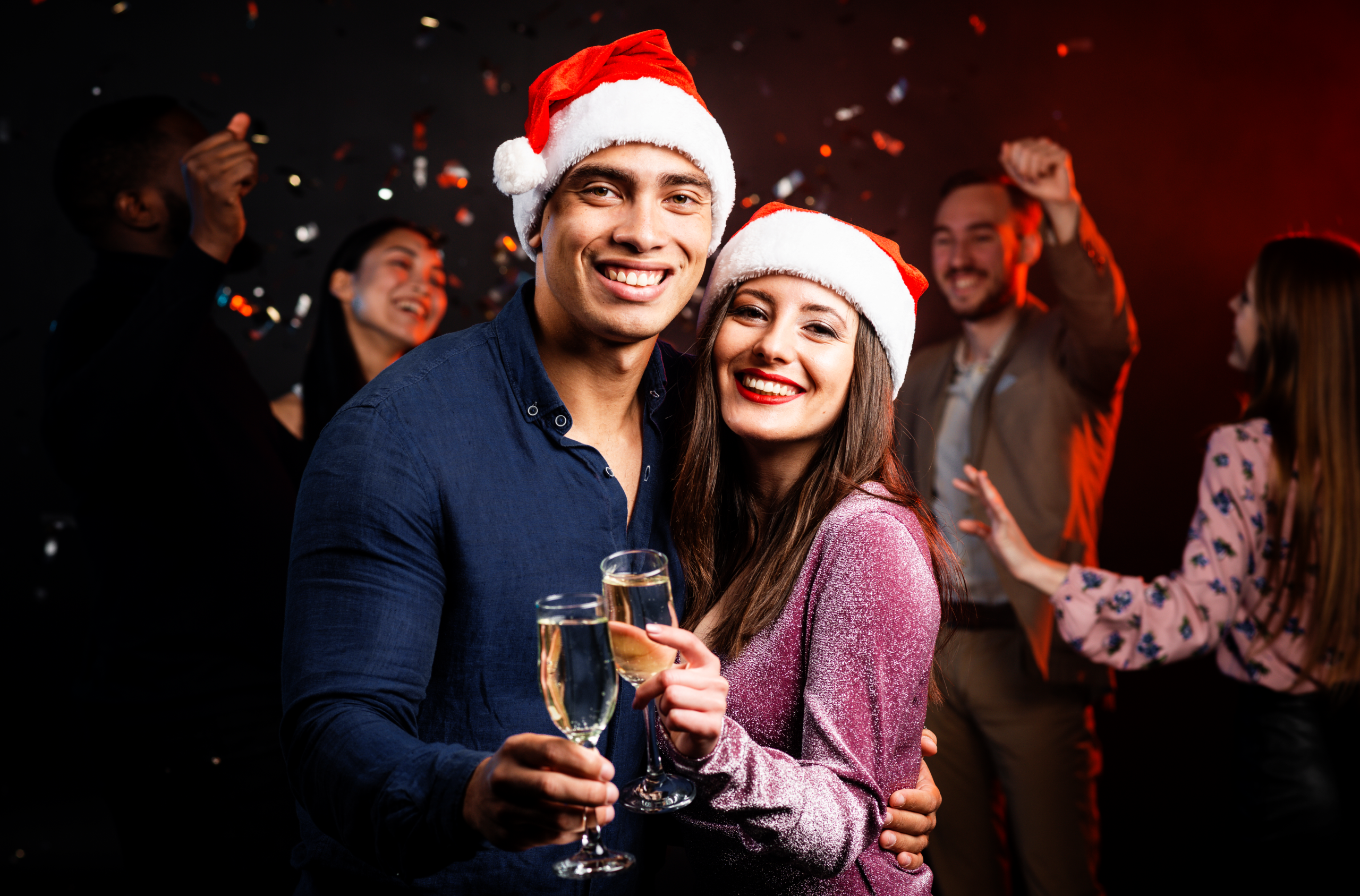 Couple posing for Christmas yacht party