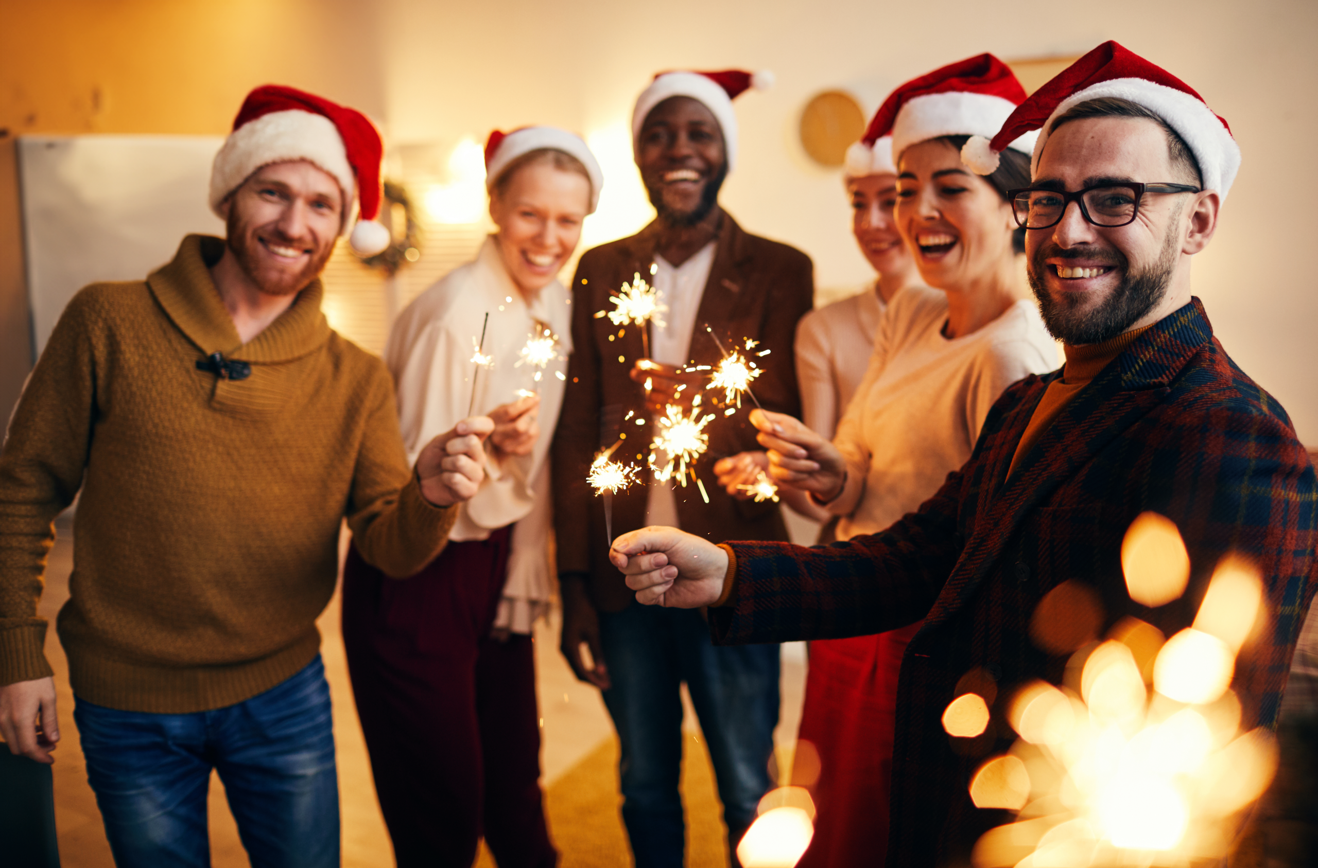 Group of friends posing on Christmas party